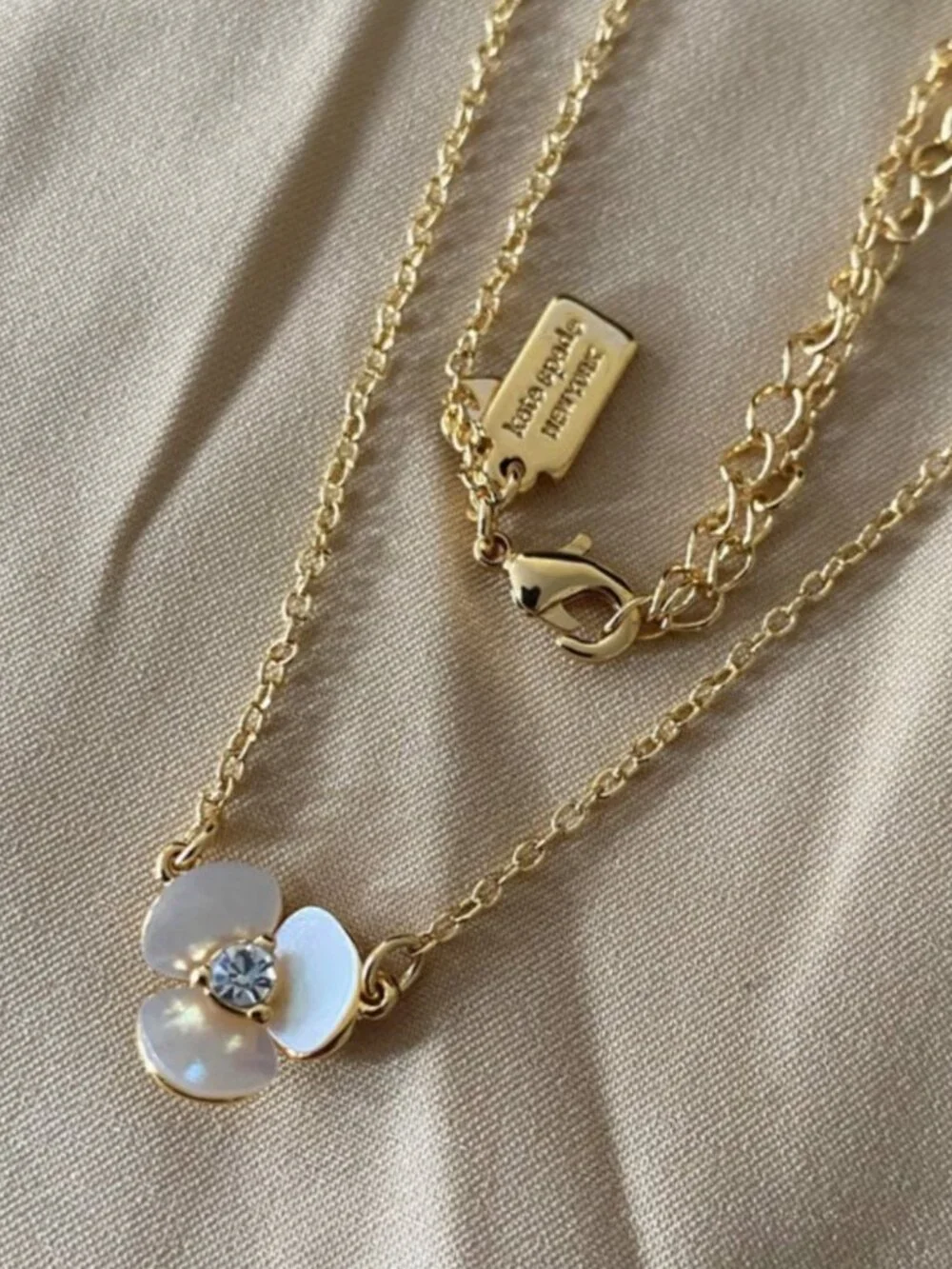 Kate Spade New York Mother of Pearl Flower Pendant Necklace Gold Tone Crystal